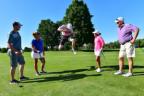 Official pro-am participant Daniel Gannon jumping in celebration of a hole-in-one at the Meijer LPGA Classic for Simply Give