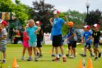 Kids participating in a free Junior Clinic through the Meijer LPGA Classic for Simply Give