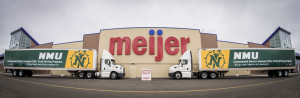 Two semi-trucks and trailers being donated to Northern Michigan University in advance of its Marquette Meijer opening