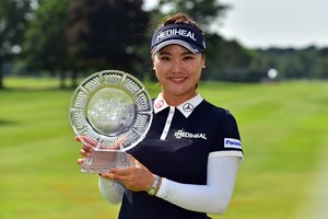 So Yeon Ryu posing with trophy after winning the Meijer LPGA Classic for Simply Give