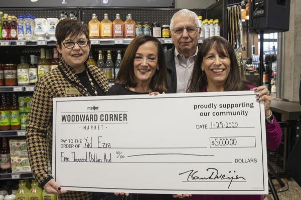 Woodward Corner Market presents Yad Ezra food bank with $5,000 check donation