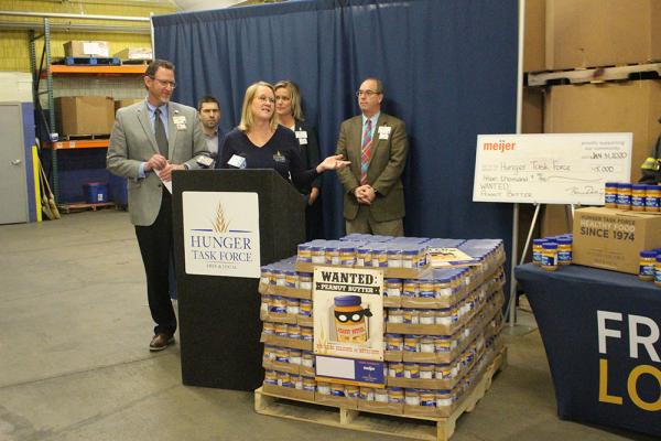 Meijer presents Hunger Task Force with $15,000 check donation and 3,500 peanut butter jars for Wanted: Peanut Butter campaign