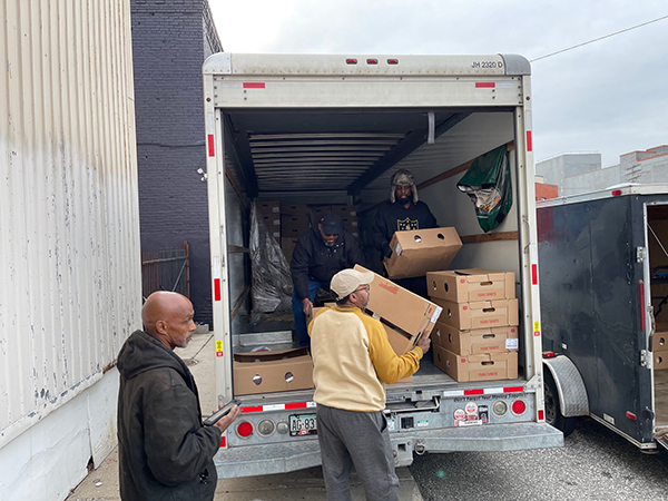 Volunteers load truck for Jive Turkeys Detroit