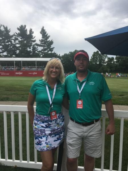 Amy Huss and Bill Corley on the golf course at Blythefield Country Club volunteering for the Meijer LPGA Classic for Simply Give.