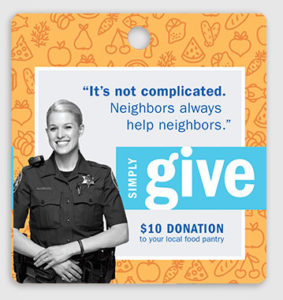 Meijer $10 Simply Give donation card featuring Community Police Officer and Streams of Hope Food Pantry volunteer, Krystal