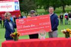 Cathy Cooper, Executive Director of the Meijer LPGA Classic, presenting $1.1 million check for the Meijer Simply Give program