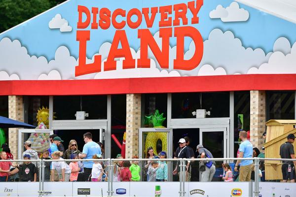 Families enjoying kids' destination Discovery Land at the Meijer LPGA Classic for Simply Give