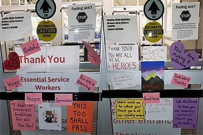 Signs thanking essential workers posted on doors at the St. Charles, Illinois Meijer