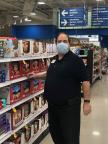 Sandusky grocery stocker David Renneckar grocery shopping for high-risk customers during the pandemic