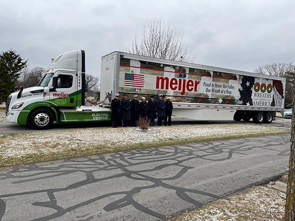Service members in front of Meijer electric semi-truck at Toledo Memorial Park for 2022 Wreaths Across America event
