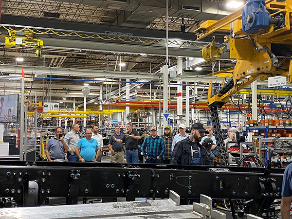 Top Meijer mechanics and drivers inspect tractors as they’re assembled at the Freightliner factory in Statesville, North Carolina.