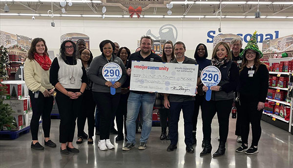 Broad Ripple, Indianapolis Meijer Team holds oversized check for $10,000 to Nine13Sports