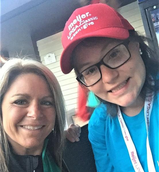 Angela Mead and her daughter volunteering at the Meijer LPGA Classic for Simply Give.