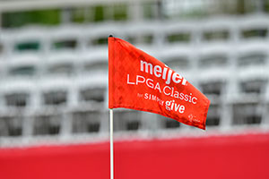 Red flag waving in wind at Blythefield Country Club for the Meijer LPGA Classic for Simply Give