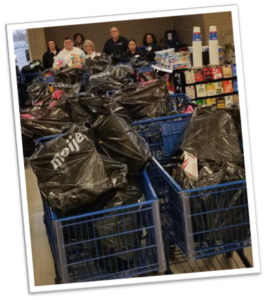 Full shopping carts for Shop with a Hero and Toys for Tots initiatives, benefitting underprivileged children